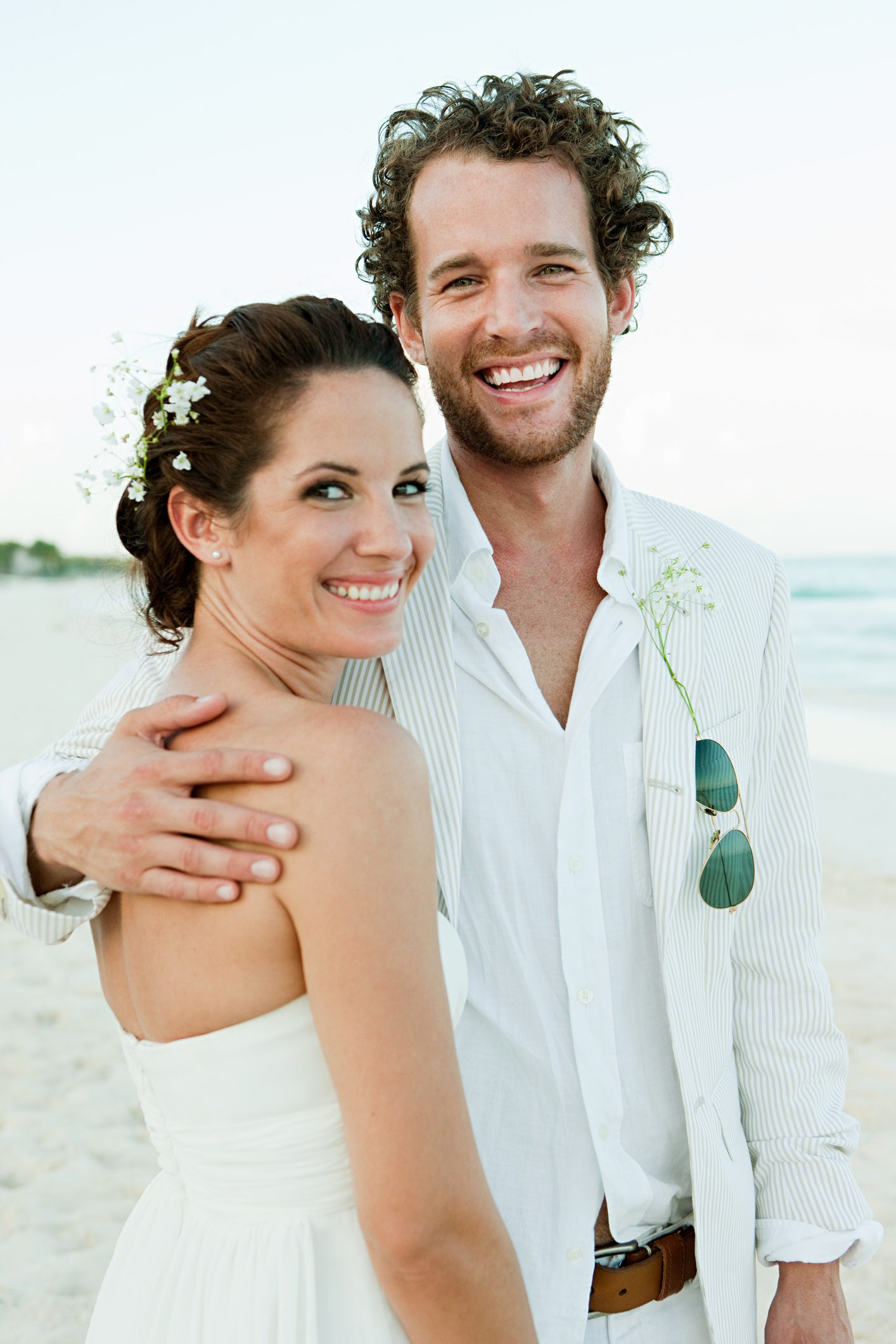 A photo of a Bride and groom on beach